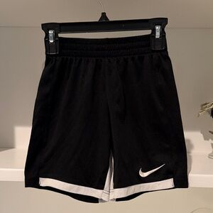 Nike Black Shorts with White Swoosh and Hem